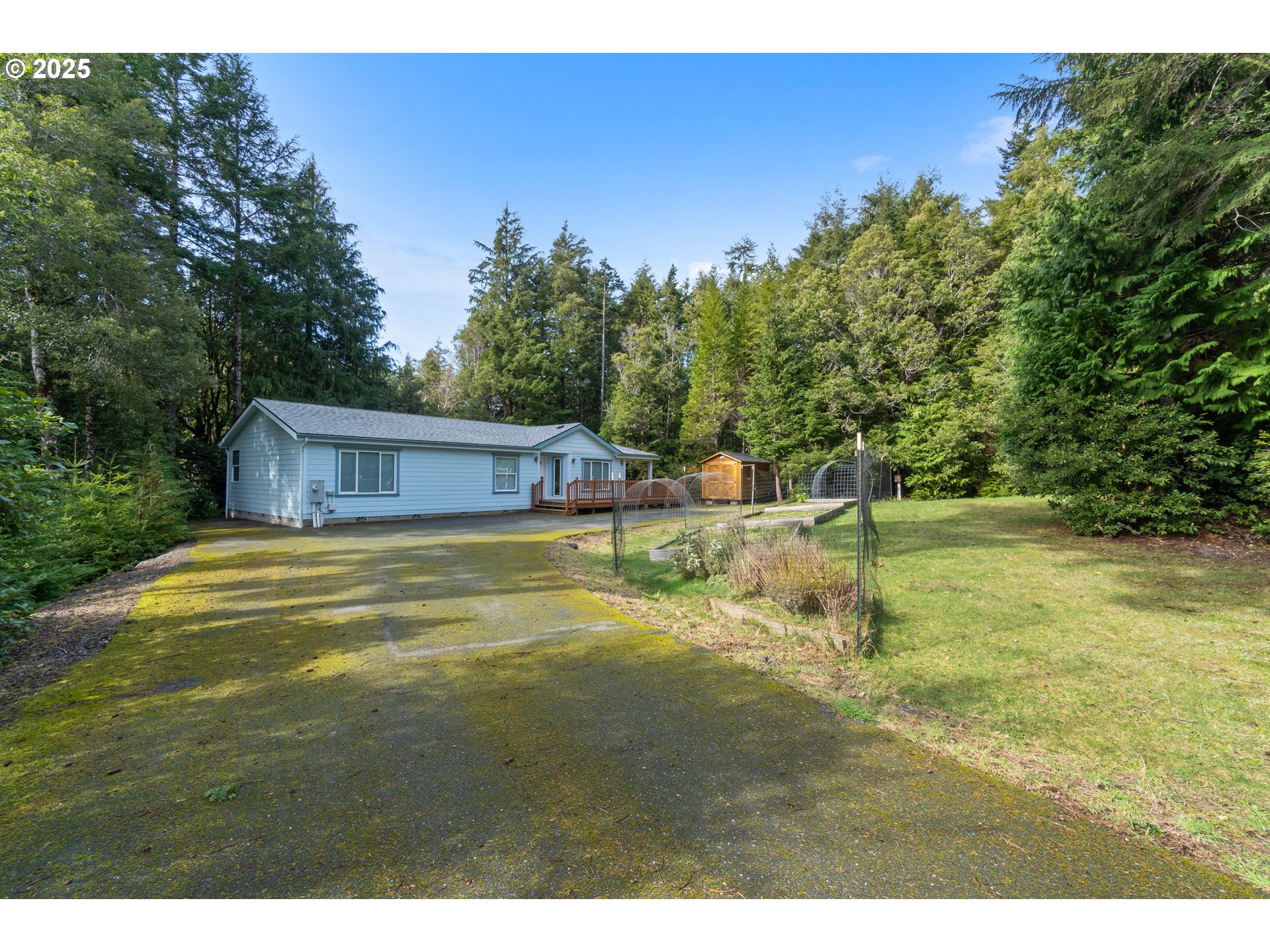41920 Park Road Port Orford, OR 97465 - Photo 15 of 18 a view of a house with a yard