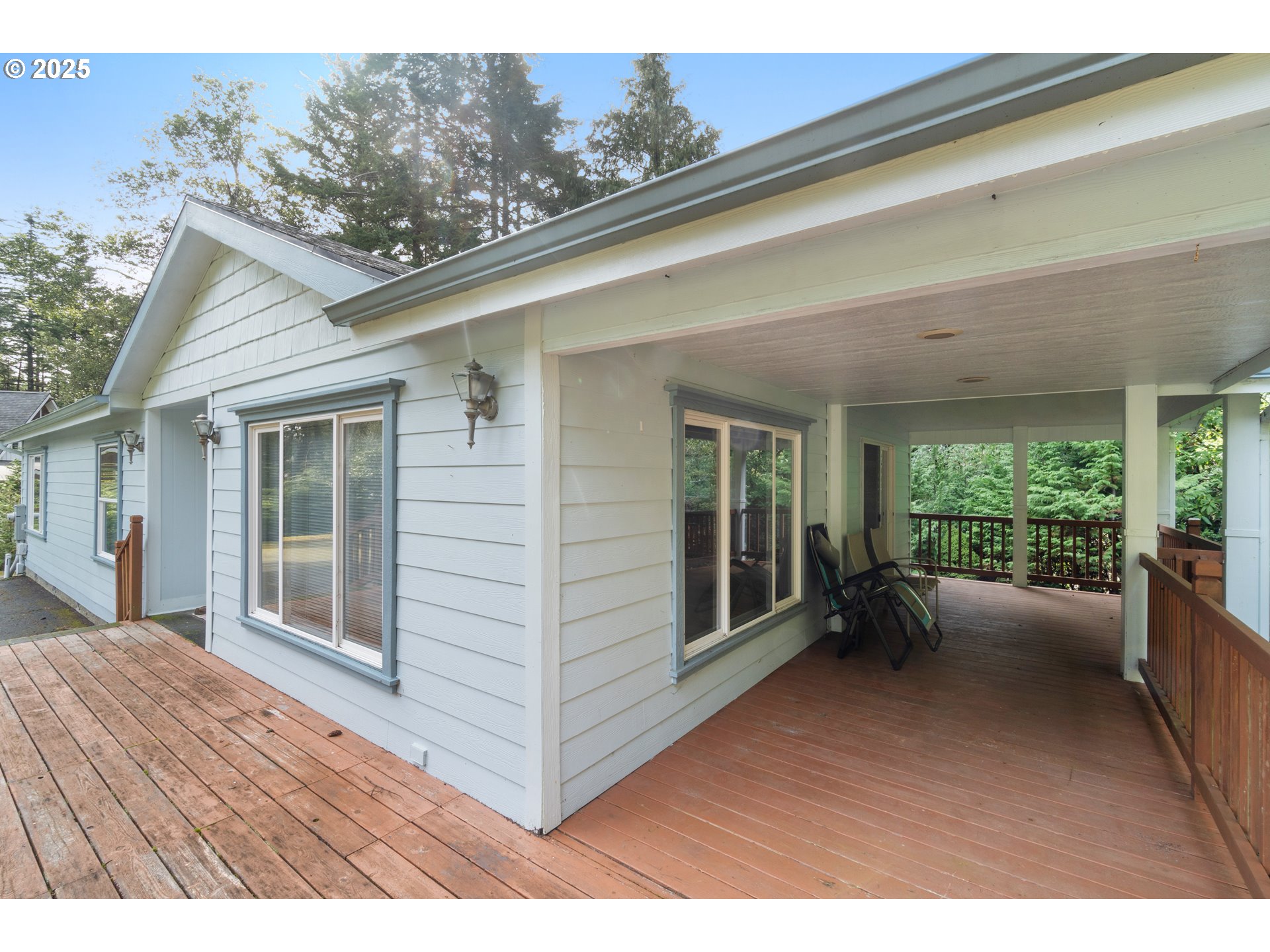 41920 Park Road Port Orford, OR 97465 - Photo 2 of 18 a balcony with furniture and a window