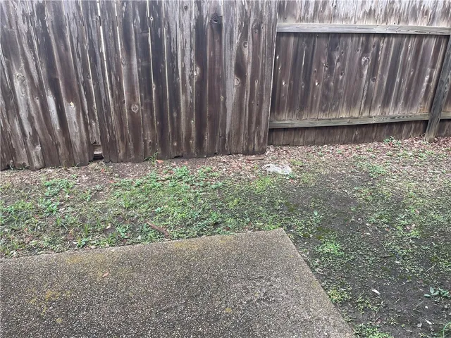 a view of wooden fence
