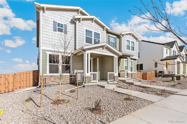 a front view of a house with a patio