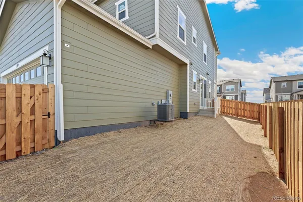 a front view of a house with garage