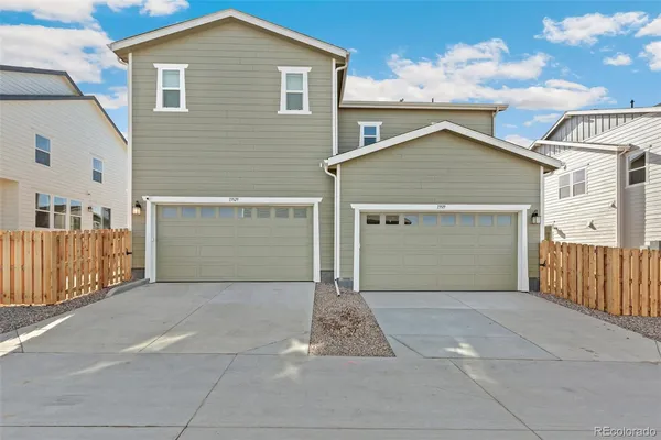 a view of a house with a garage