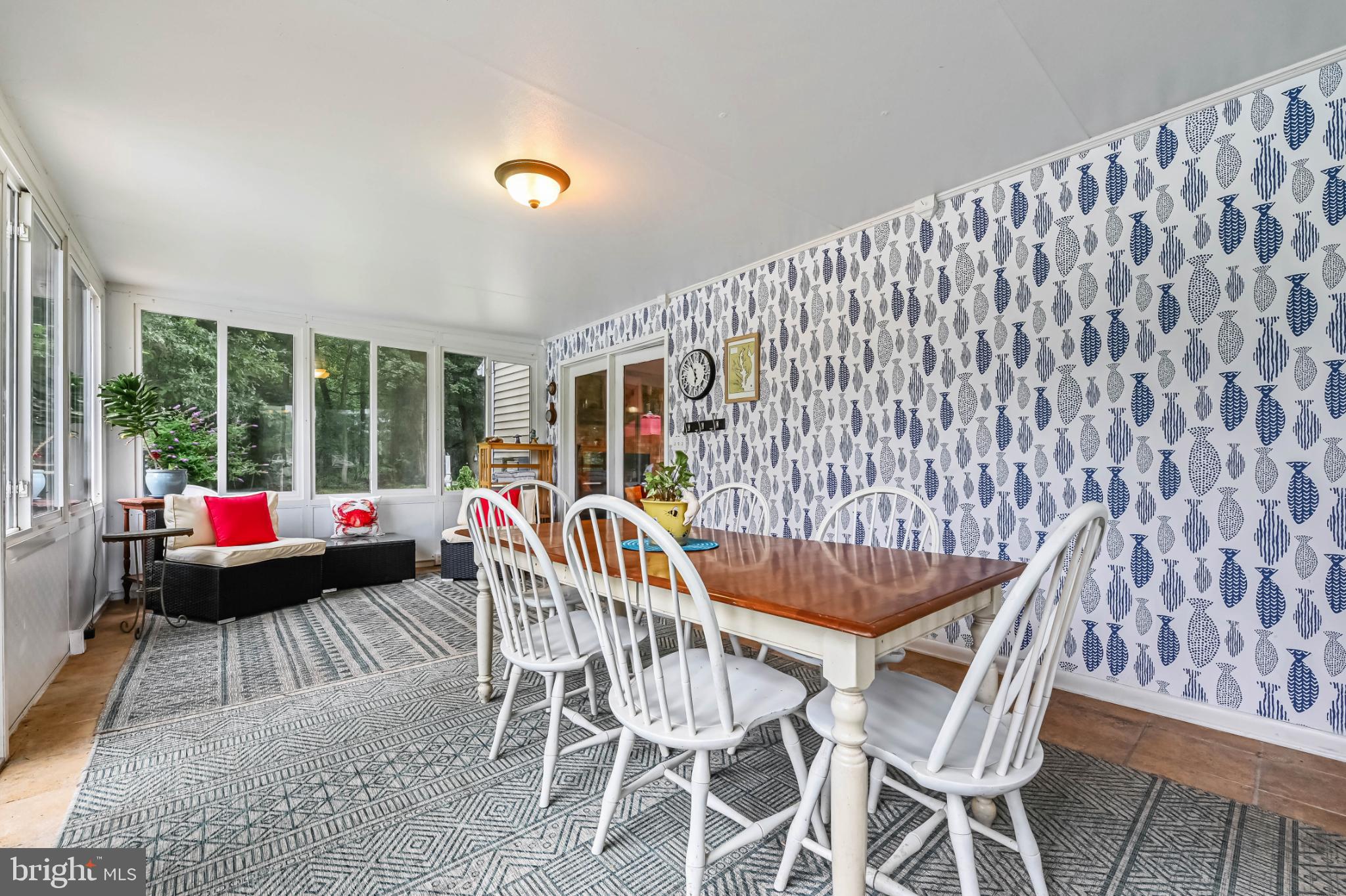 26698 Arcadia Shores Road Easton, MD 21601 - Photo 19 of 71 Bright and airy dining space with patterned walls.