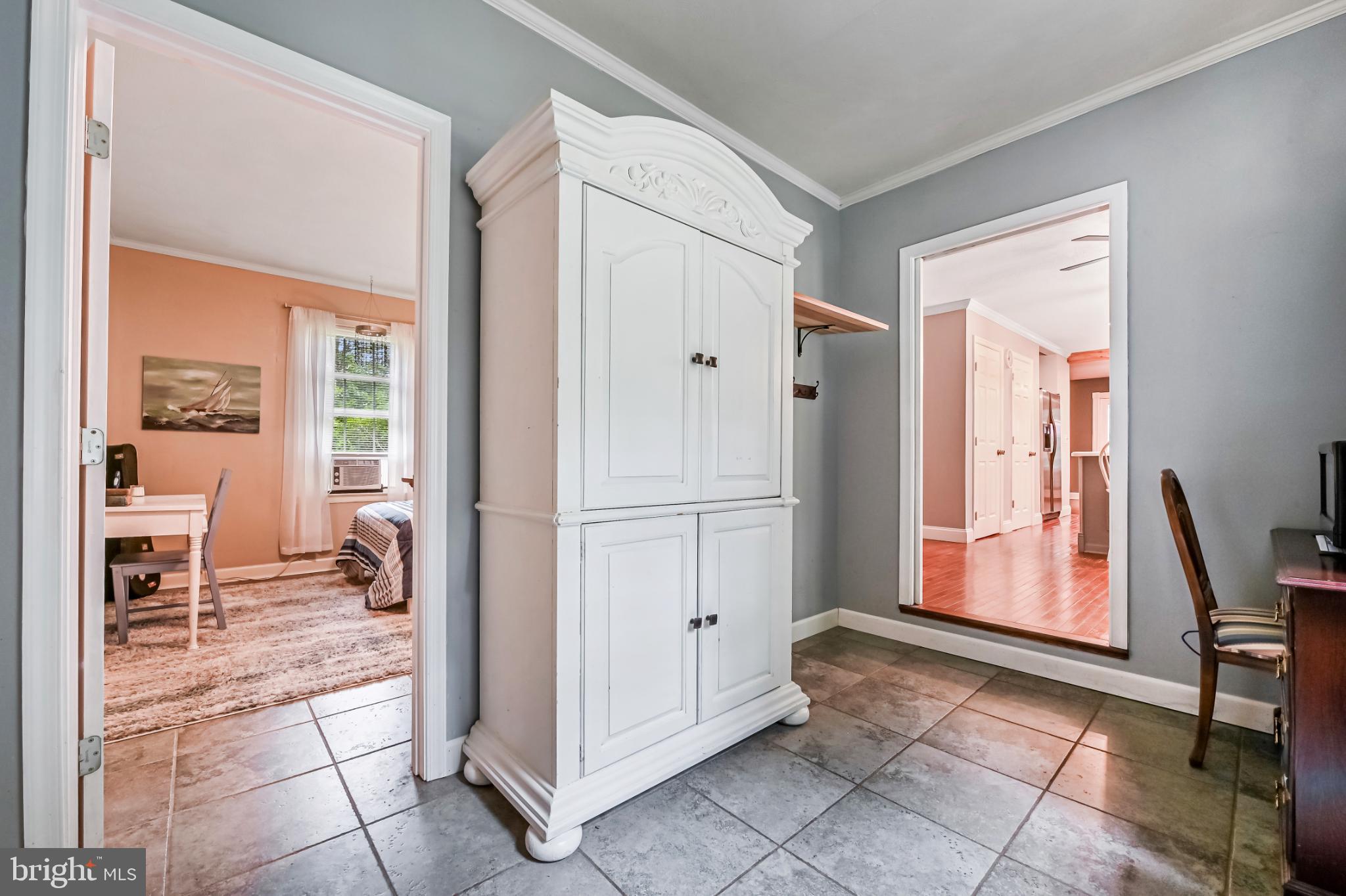 26698 Arcadia Shores Road Easton, MD 21601 - Photo 21 of 71 Charming entryway with inviting rooms beyond.