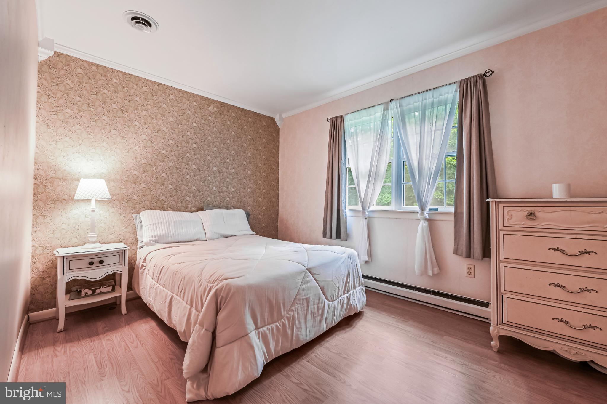 26698 Arcadia Shores Road Easton, MD 21601 - Photo 34 of 71 a bedroom with a bed and a window