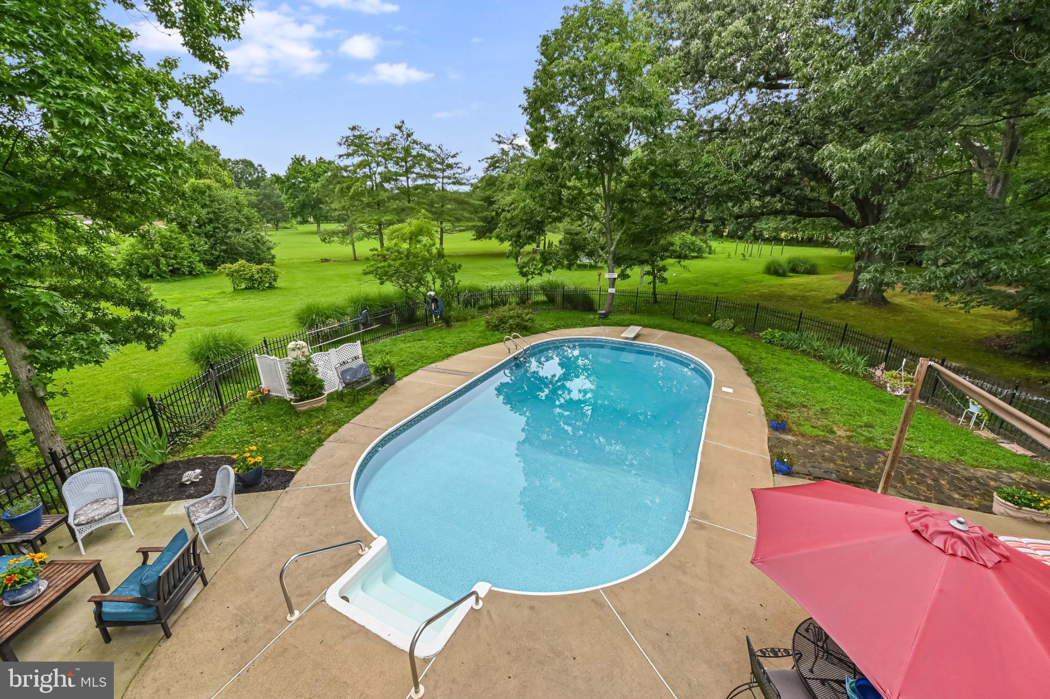 26698 Arcadia Shores Road Easton, MD 21601 - Photo 51 of 71 Serene backyard oasis with inviting pool.