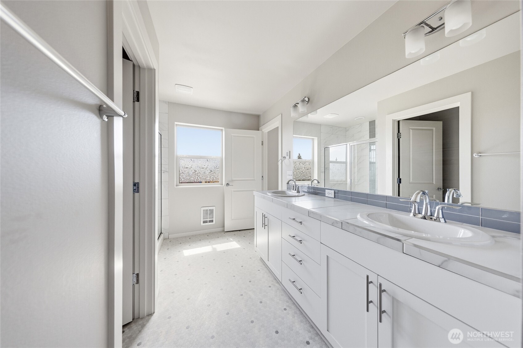 1066 Southwest 99th Place, Unit 55 Seattle, WA 98106 - Photo 6 of 21 a large bathroom with a granite countertop sink mirror and