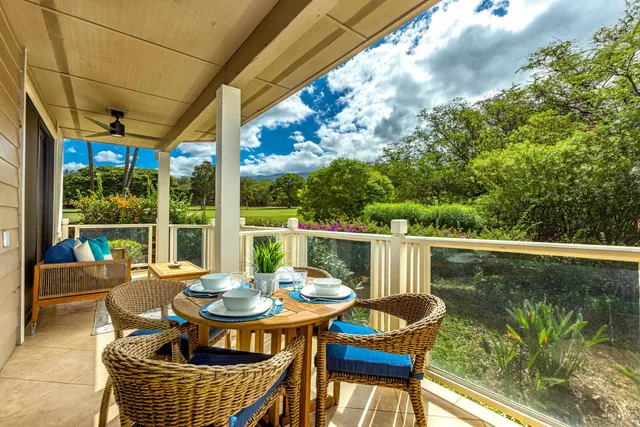 a view of balcony with furniture
