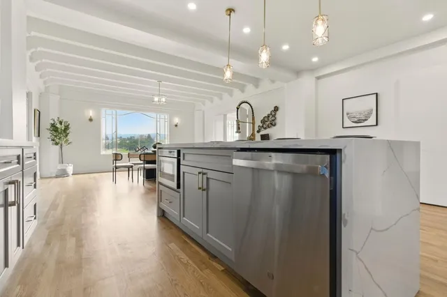 a dining room with furniture window wooden floor