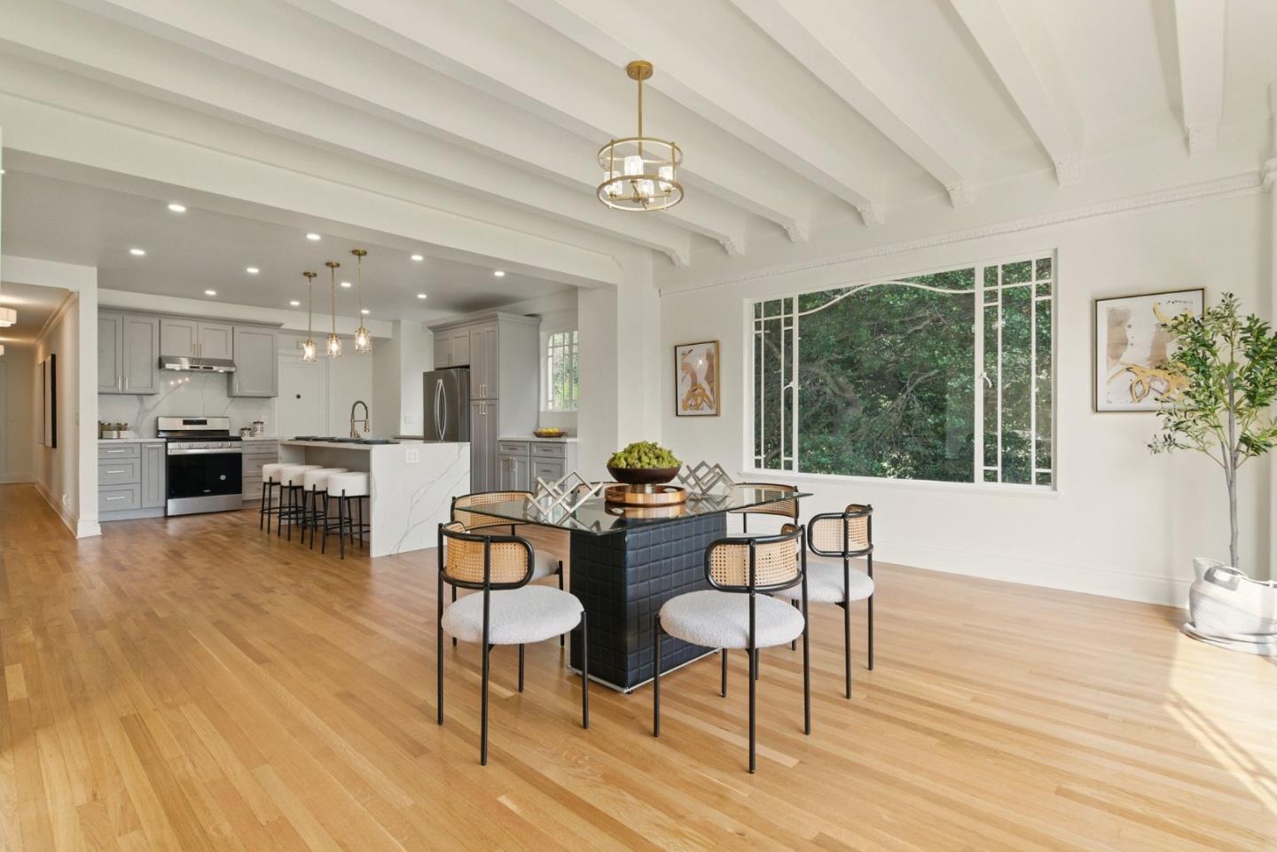 244 Lakeside Drive, Unit 202 Oakland, CA 94612 - Photo 14 of 32 a dining room with furniture window wooden floor