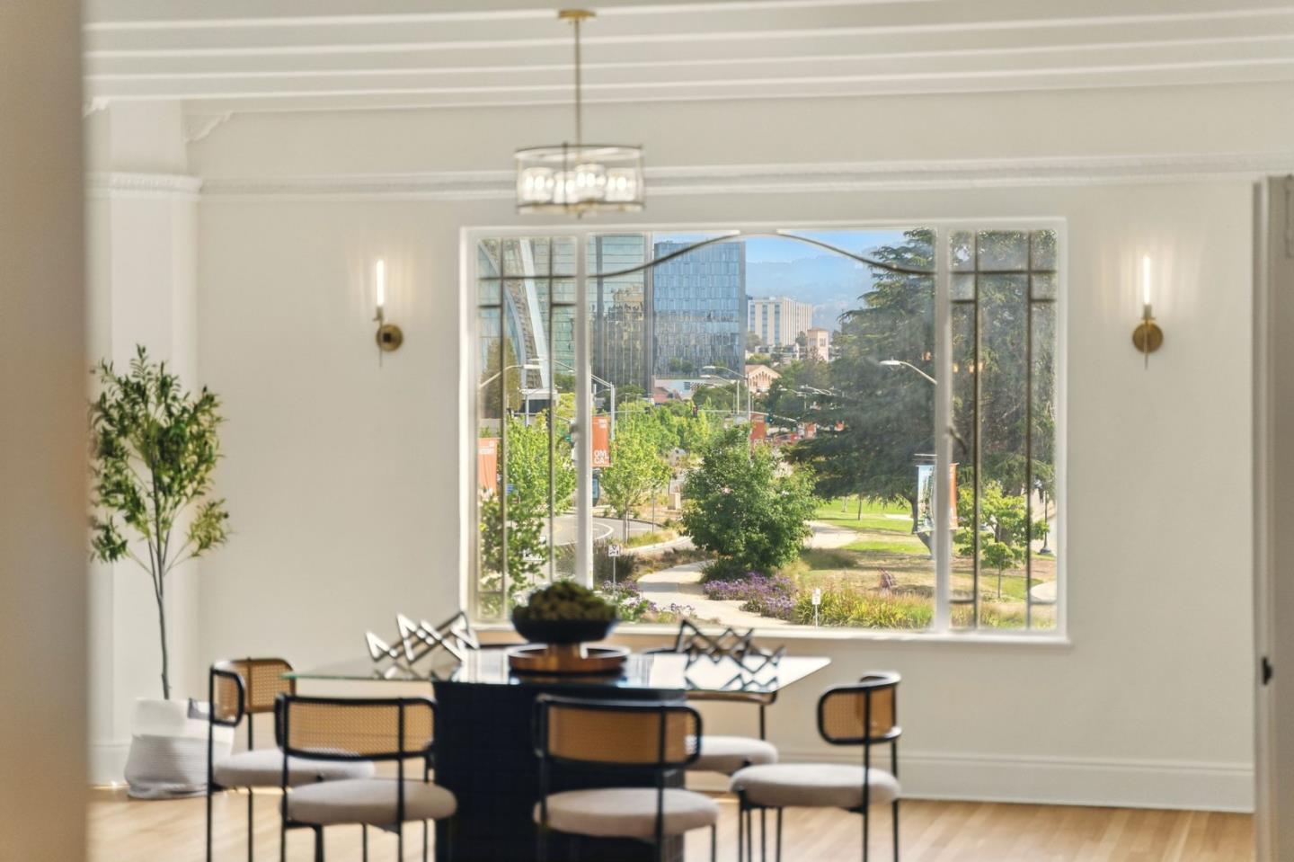 244 Lakeside Drive, Unit 202 Oakland, CA 94612 - Photo 17 of 32 a view of a dining room with furniture window and outside view