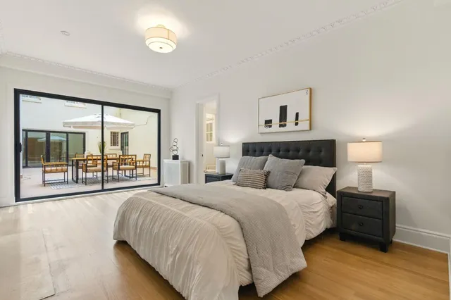 a bed room with a bed and a night lamp