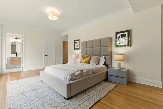 a living room with a couch and a window