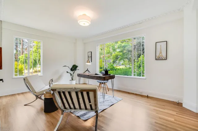 a view of a balcony with chairs