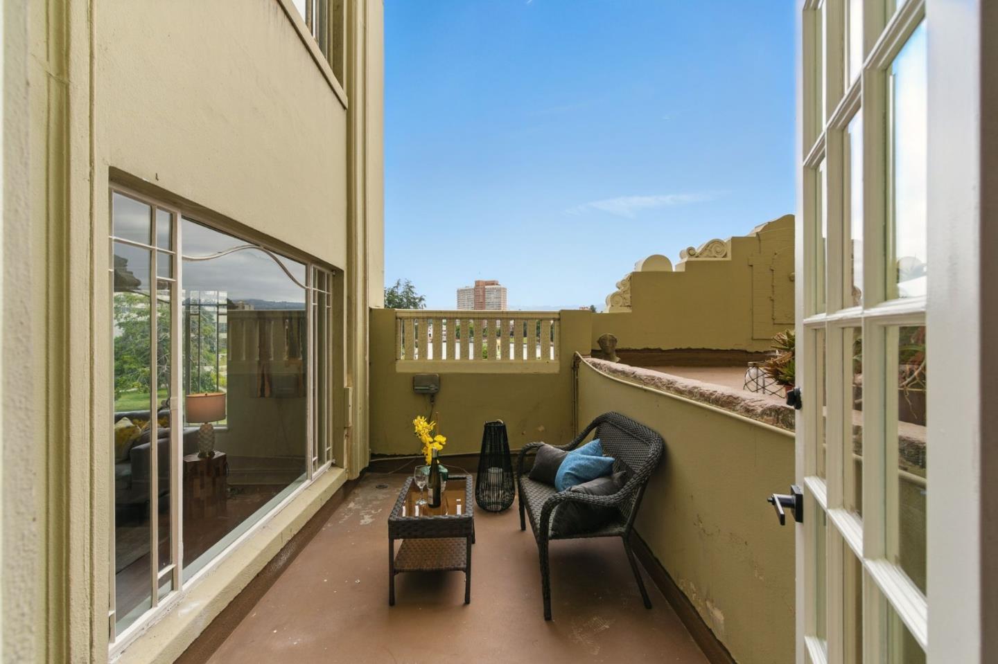 244 Lakeside Drive, Unit 202 Oakland, CA 94612 - Photo 24 of 32 a view of a balcony with chairs