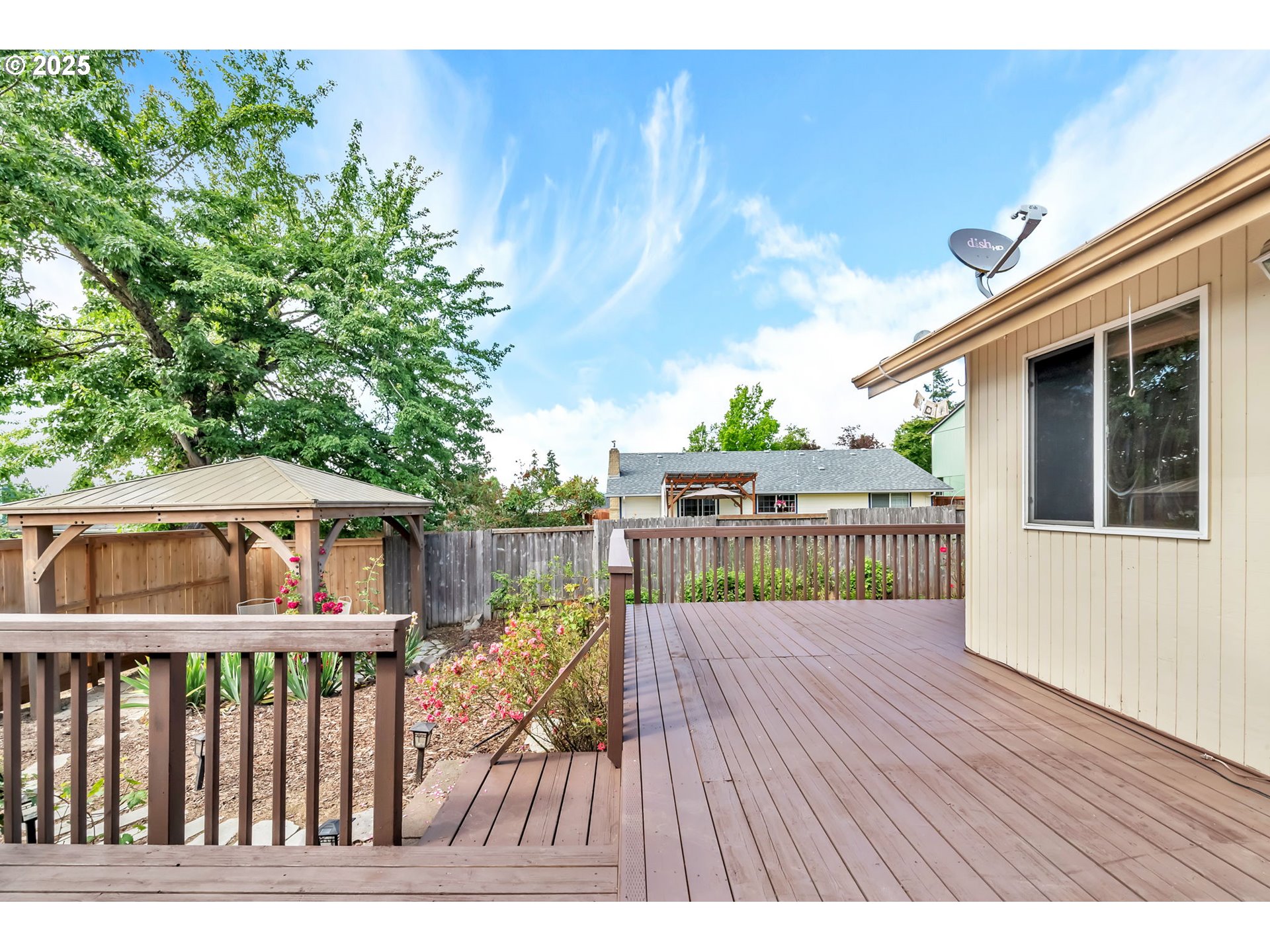 590 Granite Place Springfield, OR 97477 - Photo 17 of 21 a view of a house with wooden deck