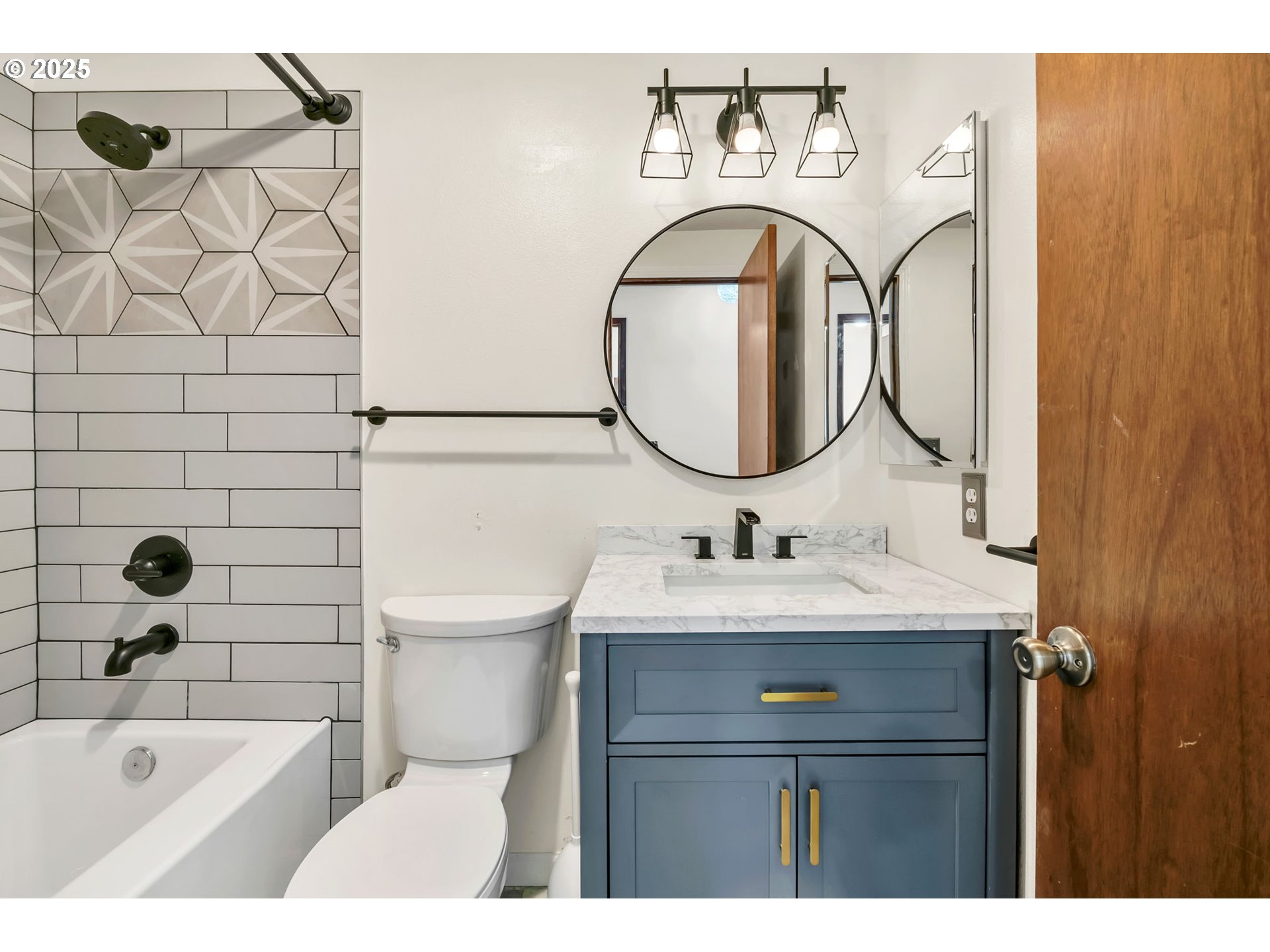 590 Granite Place Springfield, OR 97477 - Photo 9 of 21 a bathroom with a sink vanity toilet and a mirror