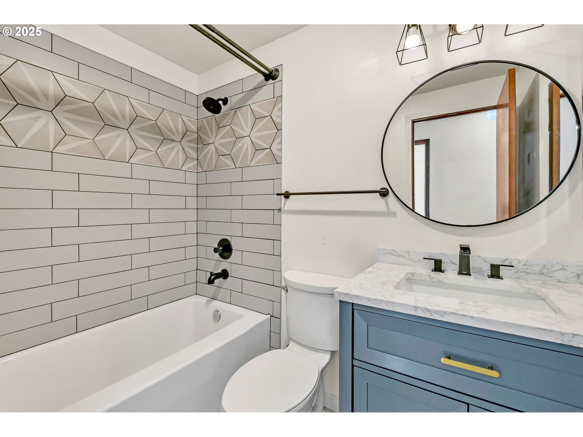 590 Granite Place Springfield, OR 97477 - Photo 10 of 21 a bathroom with a sink and a mirror