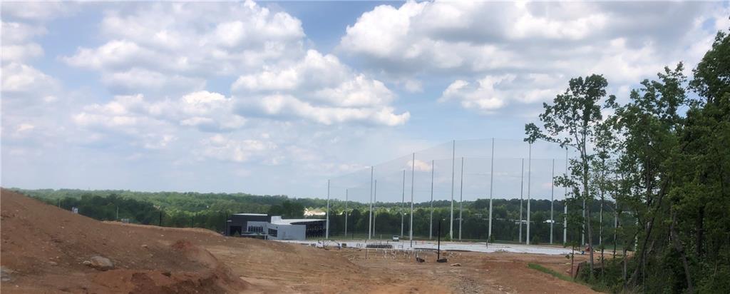 1375 Rock Springs Road Buford, GA 30519 - Photo 25 of 25 a view of a garden with a bench
