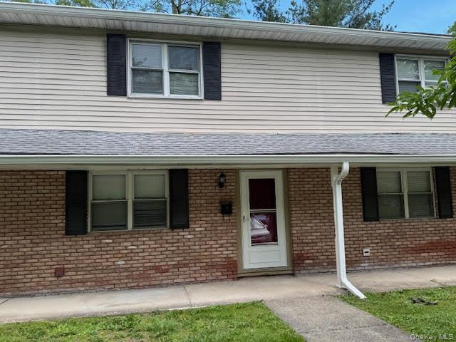 23 Brewster Road Cornwall, NY 12518 - Photo 38 of 39 View of front of property with brick and vinyl siding