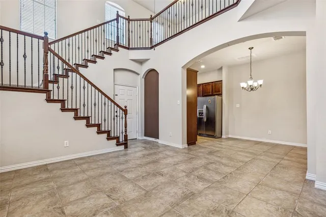 a view of a hallway with staircase