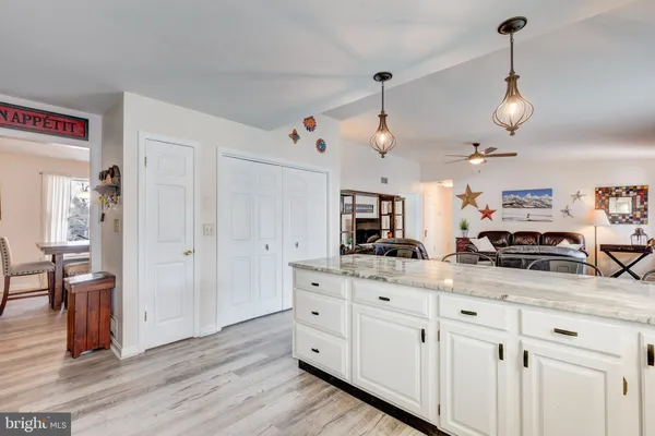 a bedroom with a bed and a television