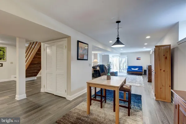 a bedroom with a bed and a table in it