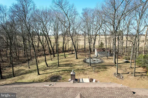 a aerial view of residential houses with outdoor space