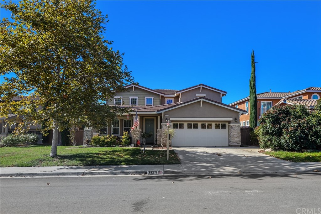 39271 Shree Road Temecula, CA 92591 - Photo 1 of 1 a front view of a house with a garden