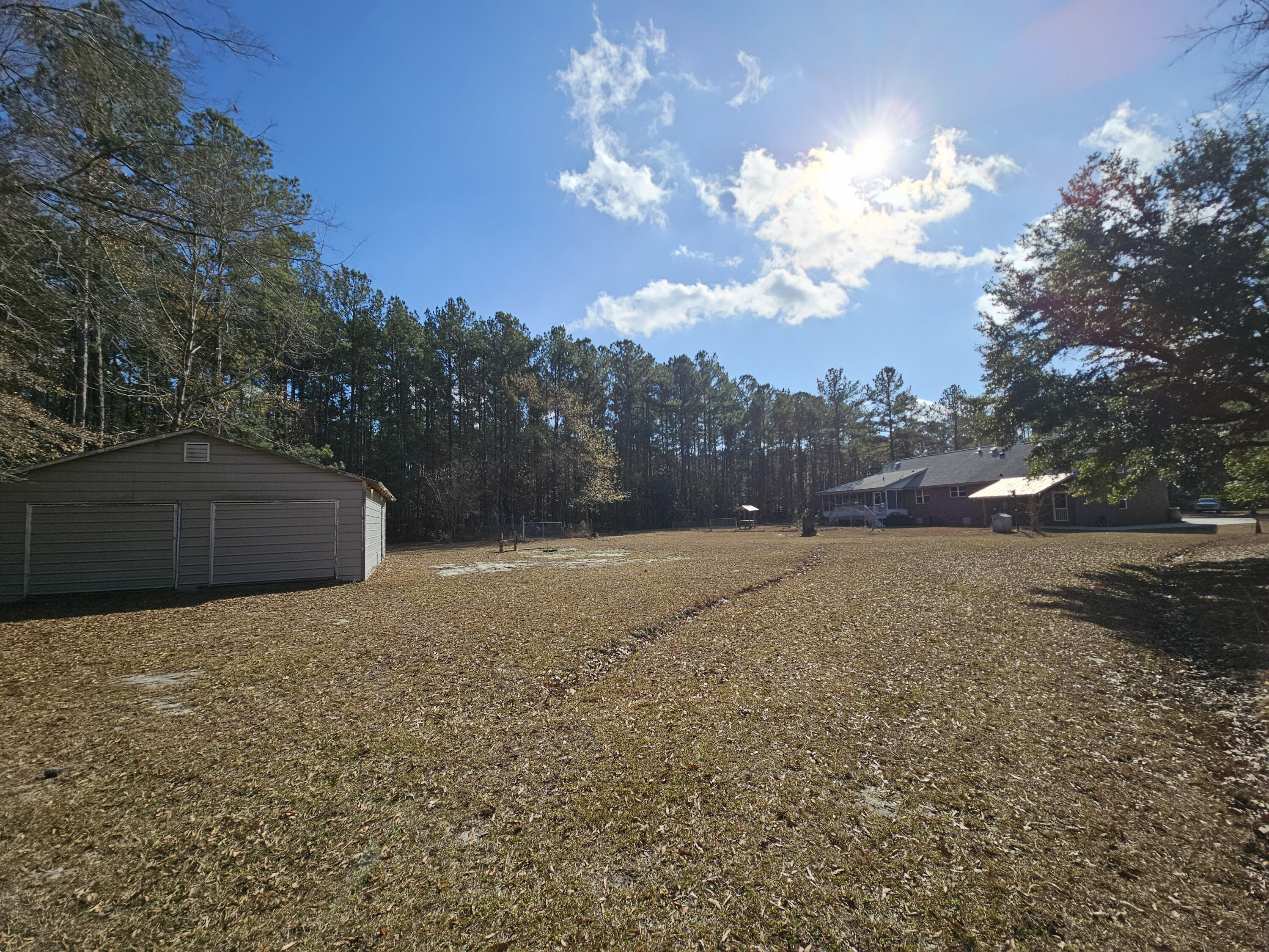 2300 Bethera Road Bonneau, SC 29431 - Photo 38 of 43 38-Shed and House