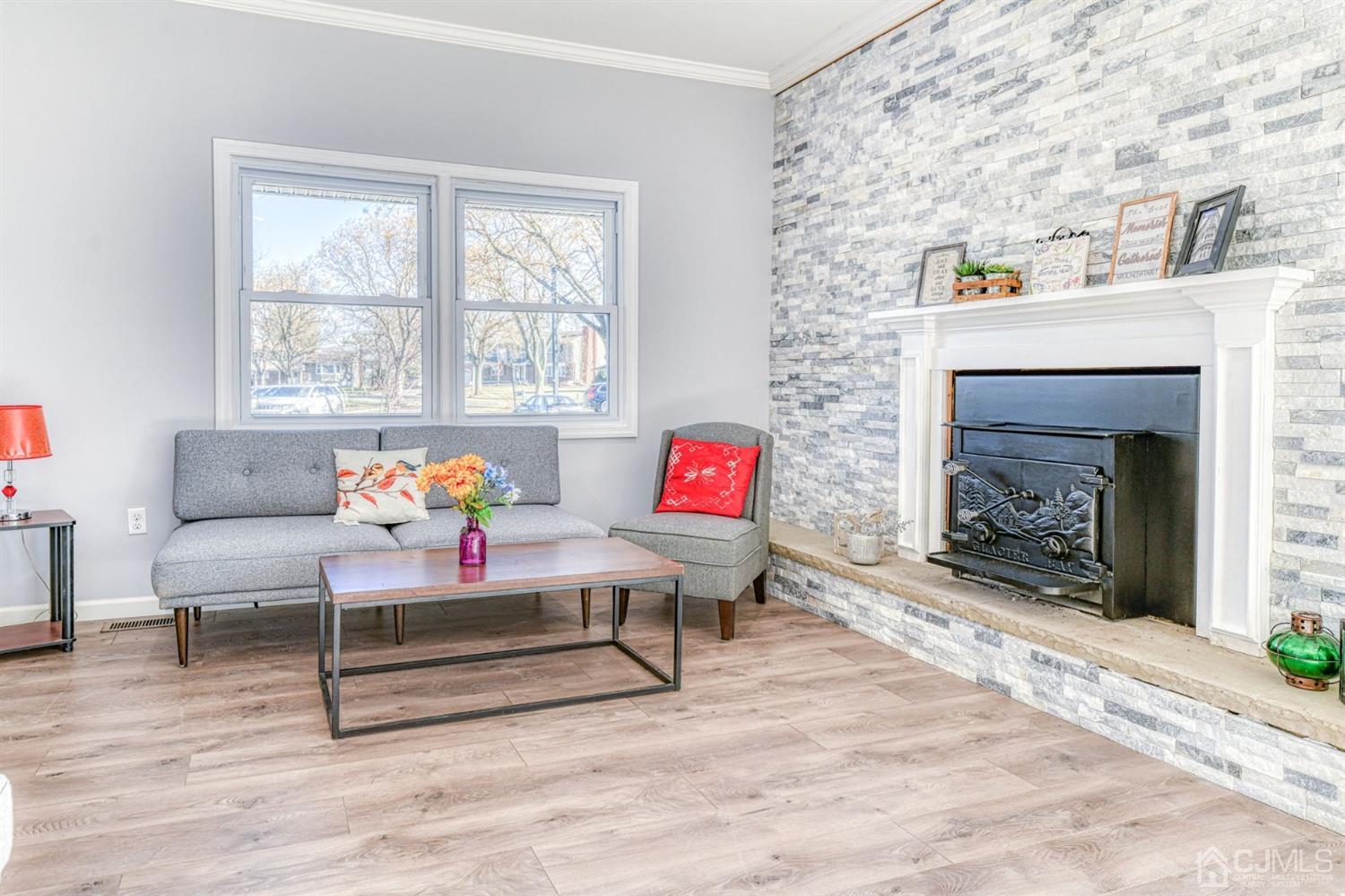 22 Devon Drive Piscataway, NJ 08854 - Photo 21 of 37 a living room with furniture and a fireplace