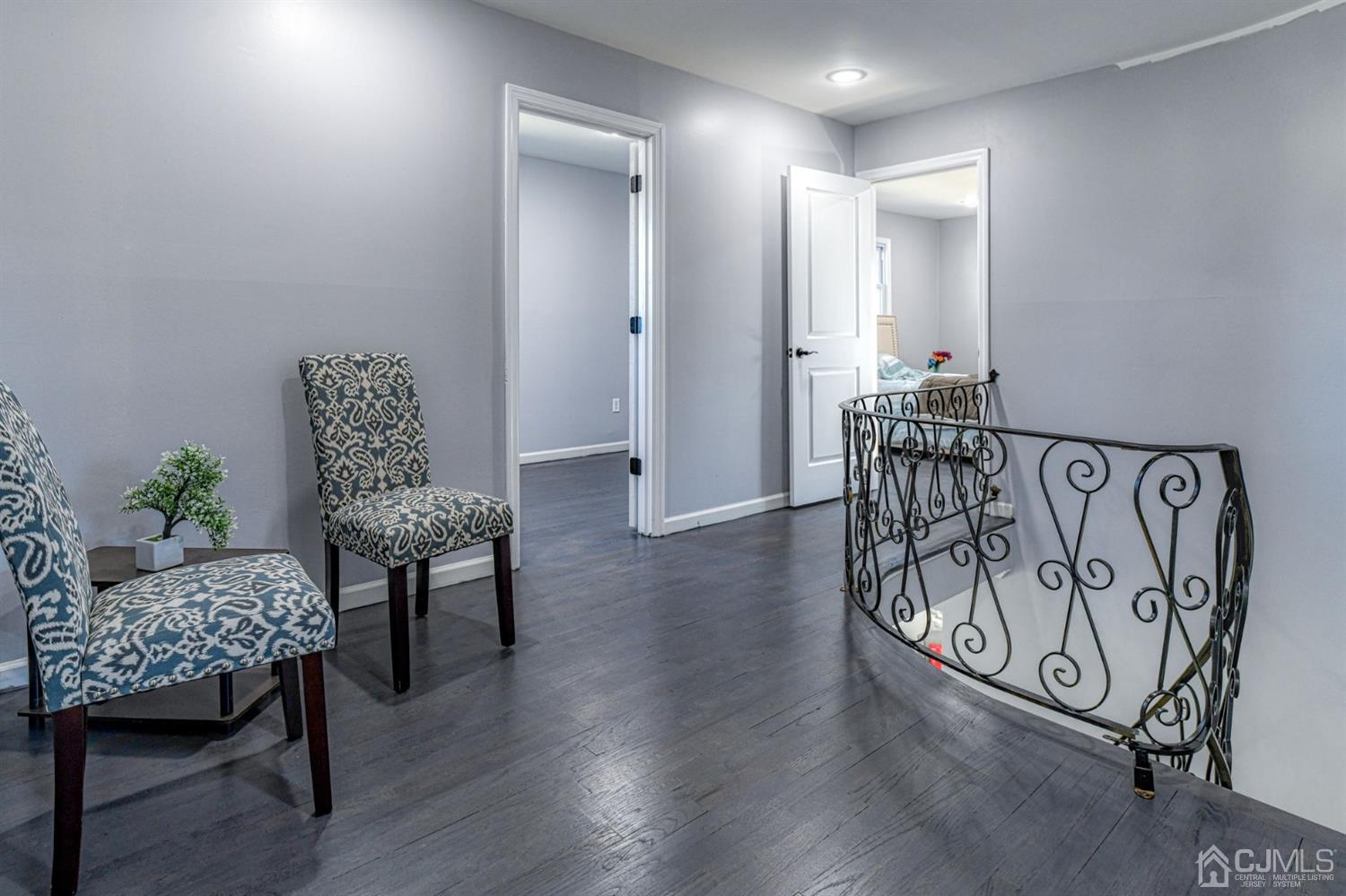 22 Devon Drive Piscataway, NJ 08854 - Photo 28 of 37 a view of a room with furniture and wooden floor