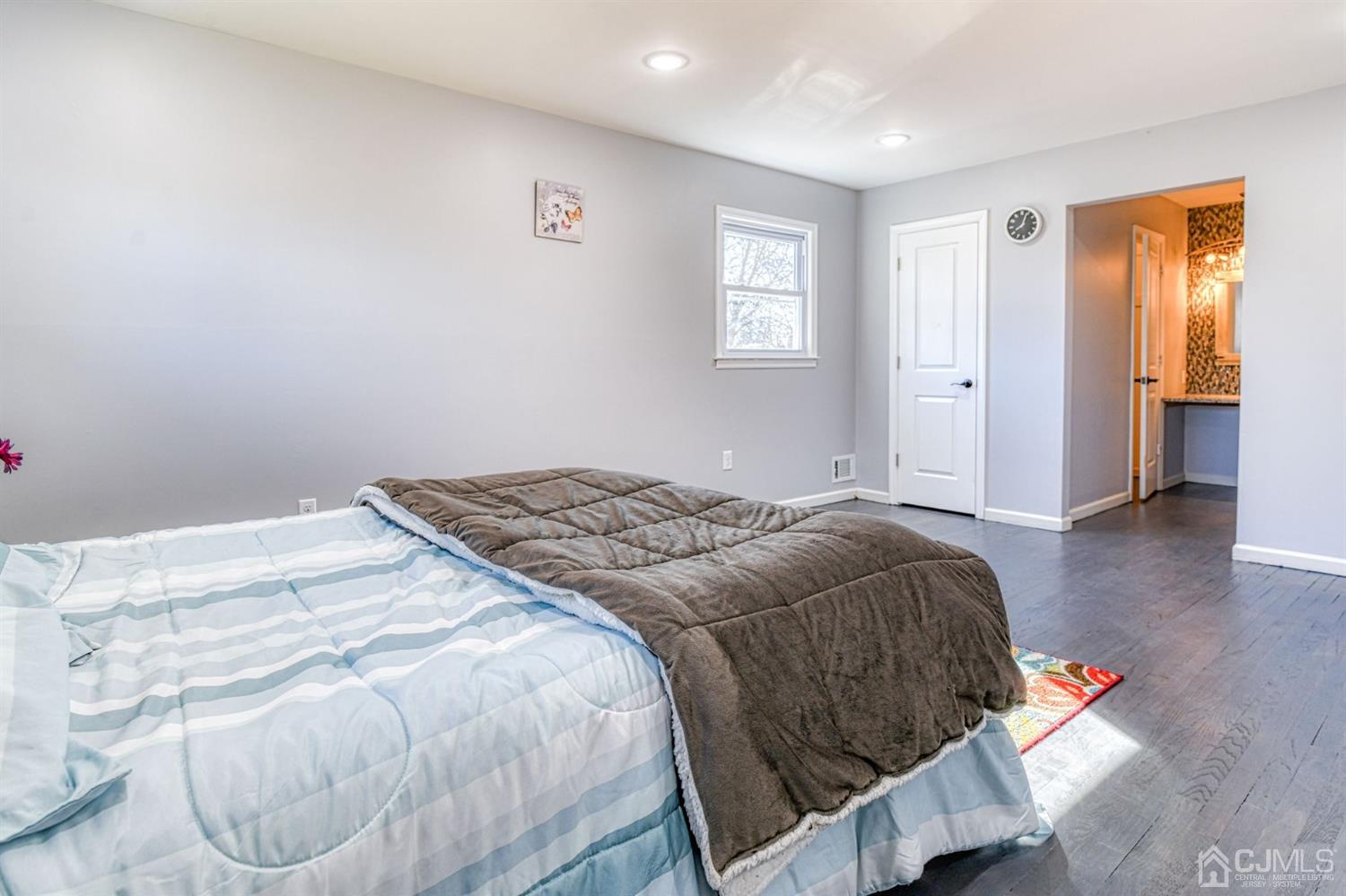 22 Devon Drive Piscataway, NJ 08854 - Photo 31 of 37 a bedroom with a bed and a window