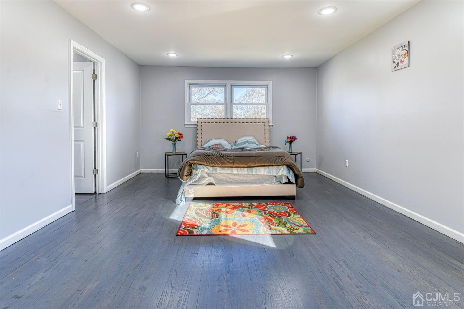 22 Devon Drive Piscataway, NJ 08854 - Photo 33 of 37 a room with wooden floor and window