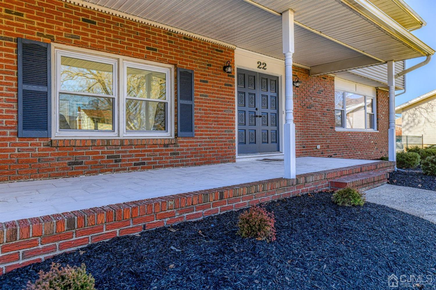 22 Devon Drive Piscataway, NJ 08854 - Photo 5 of 37 a view of a house with a yard