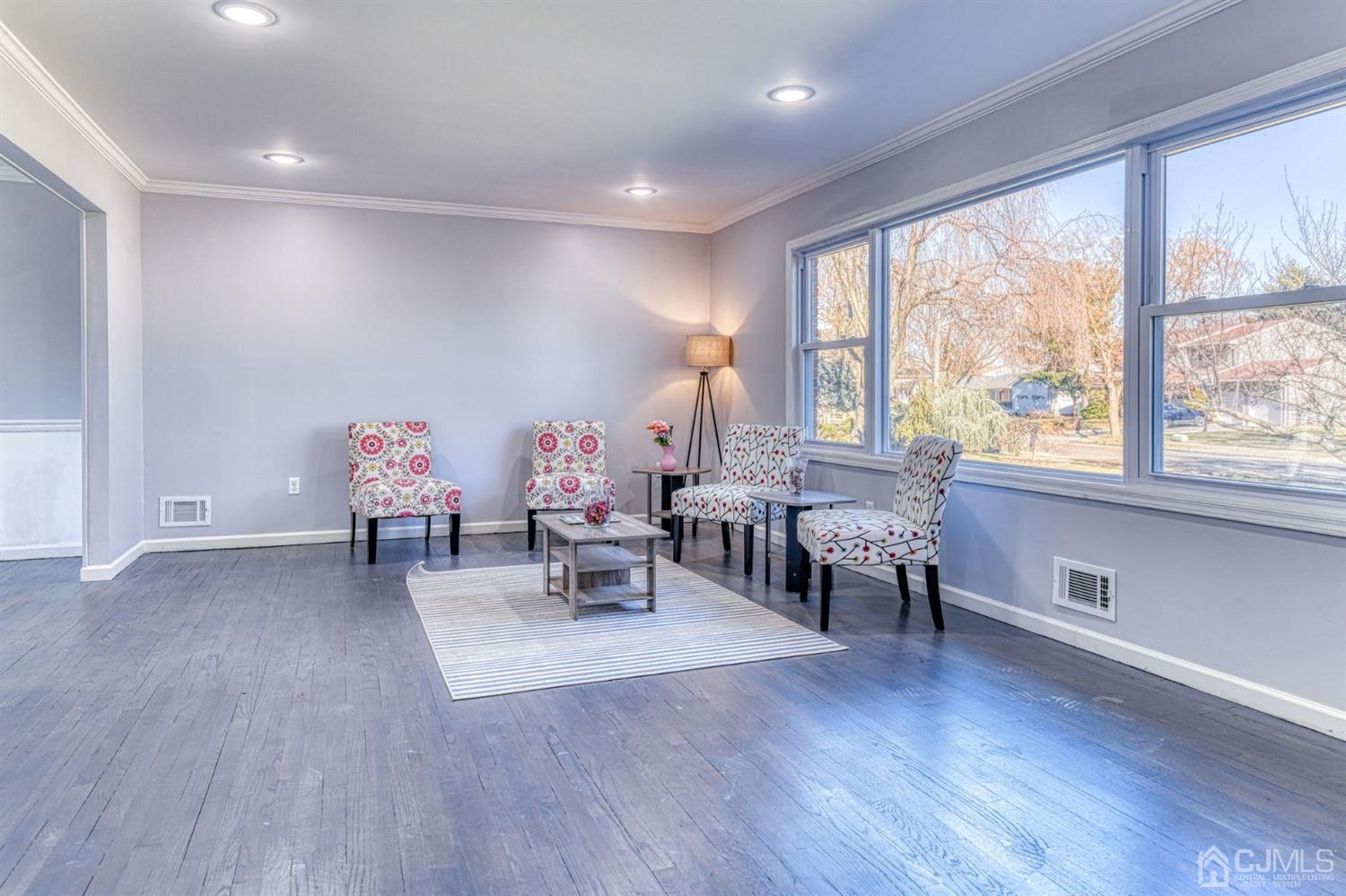 22 Devon Drive Piscataway, NJ 08854 - Photo 6 of 37 a living room with furniture and a large window