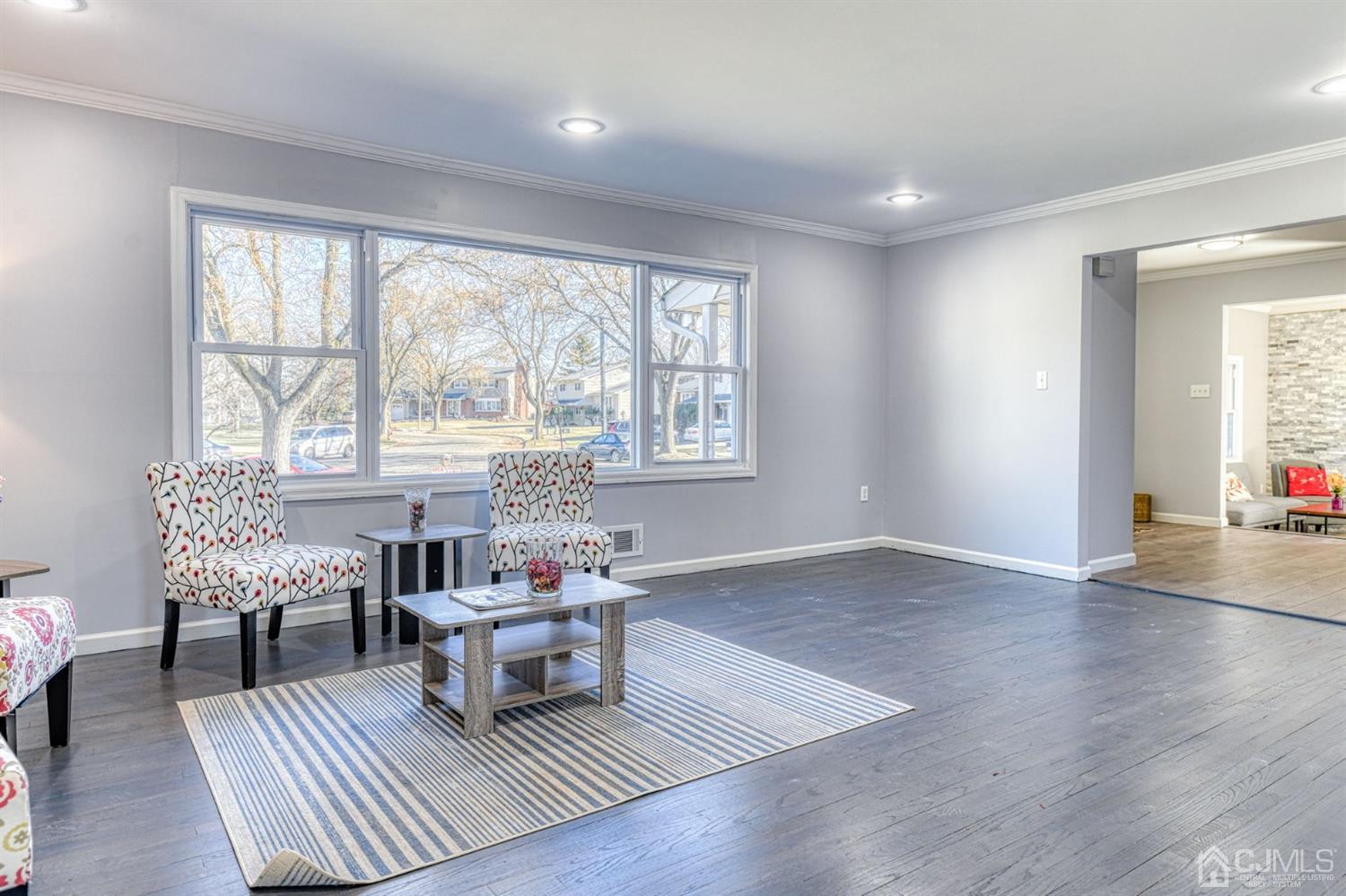 22 Devon Drive Piscataway, NJ 08854 - Photo 7 of 37 a living room with furniture and a large window