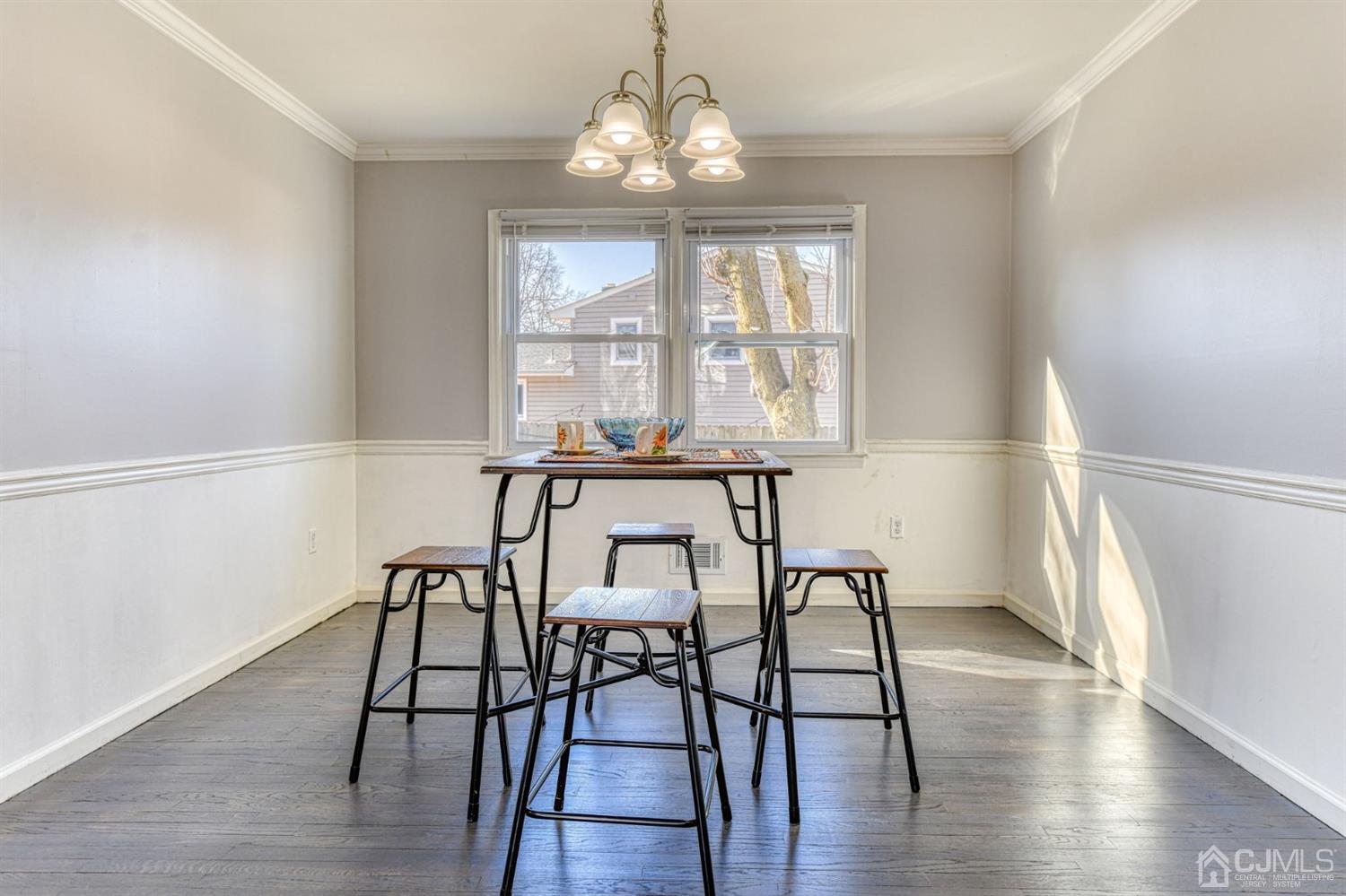 22 Devon Drive Piscataway, NJ 08854 - Photo 9 of 37 a view of a dining room with furniture window and wooden floor