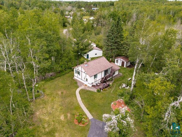 3616 Lavaque Road Hermantown, MN 55811 - Photo 11 of 43 White exterior with brown trim and a reddish-brown roof