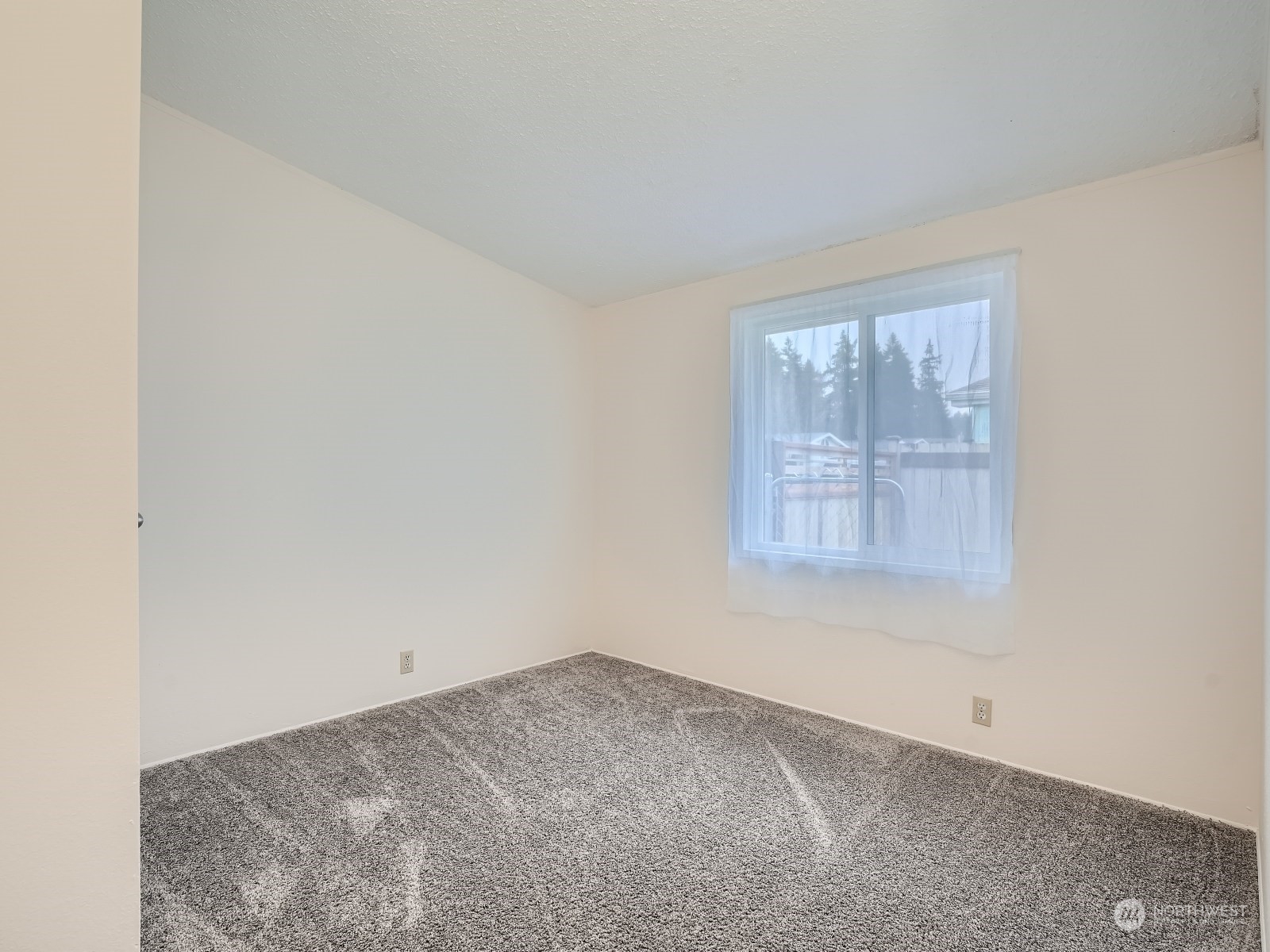 2505 South 371st Street, Unit 37 Federal Way, WA 98003 - Photo 15 of 27 an empty room with windows