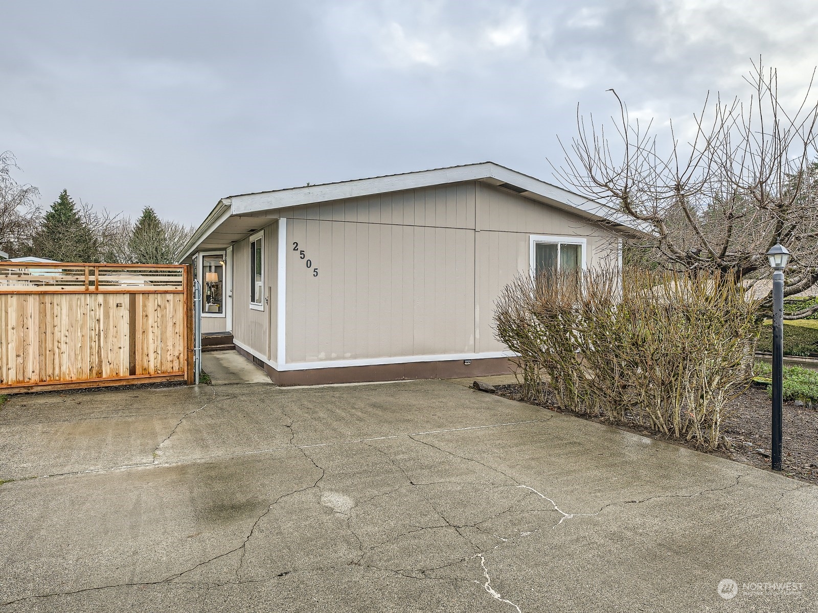 2505 South 371st Street, Unit 37 Federal Way, WA 98003 - Photo 2 of 27 a view of backyard of house