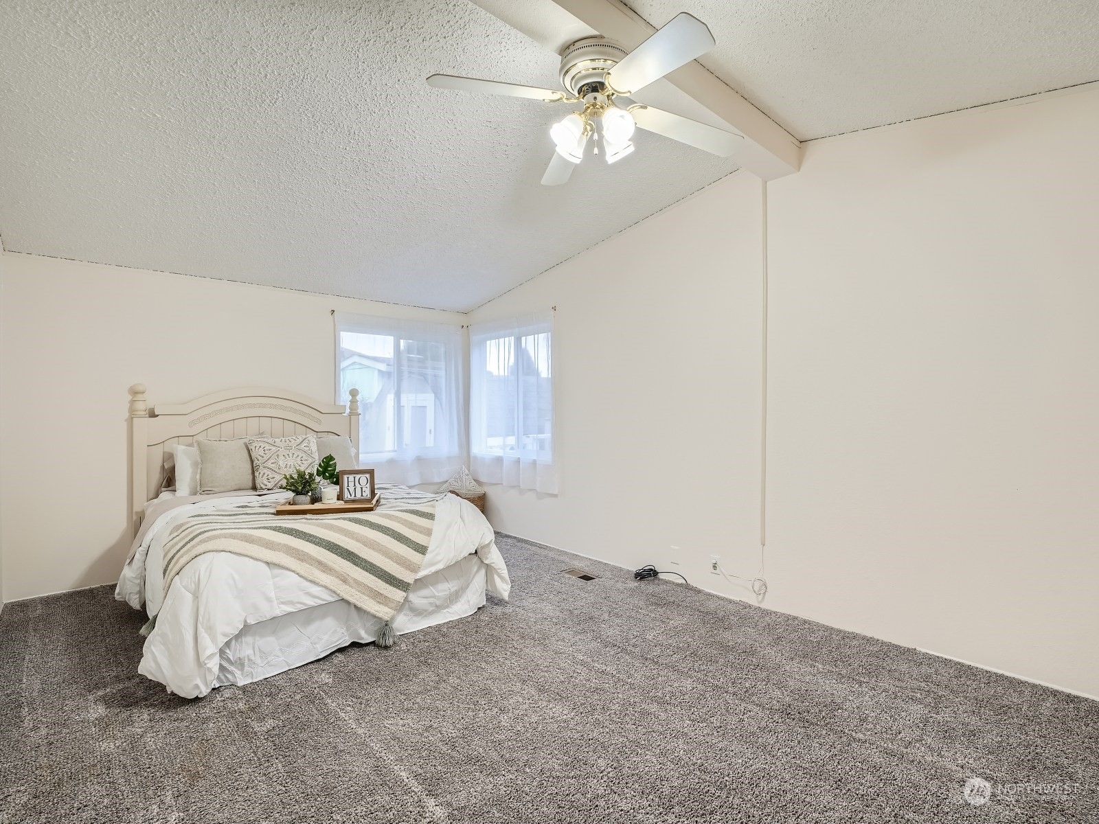 2505 South 371st Street, Unit 37 Federal Way, WA 98003 - Photo 10 of 27 a bedroom with a bed ceiling fan and a window