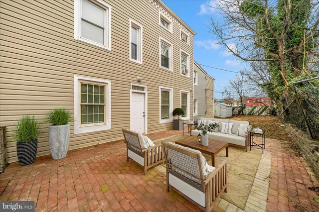 a building outdoor space with patio furniture