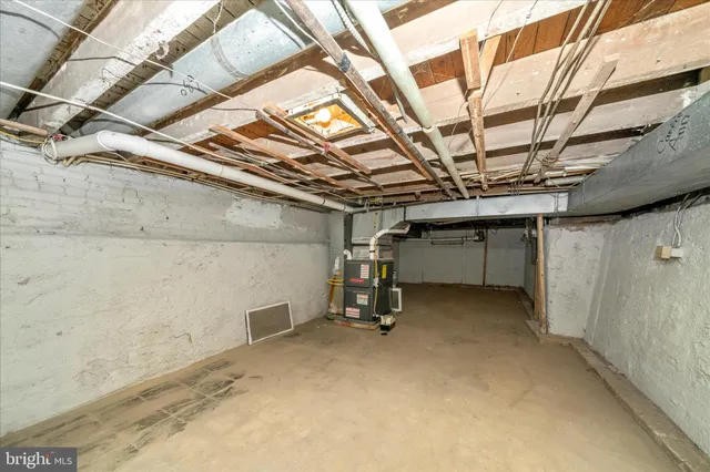 a view of a room with wooden walls