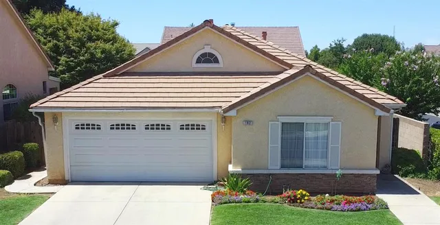a front view of house with yard