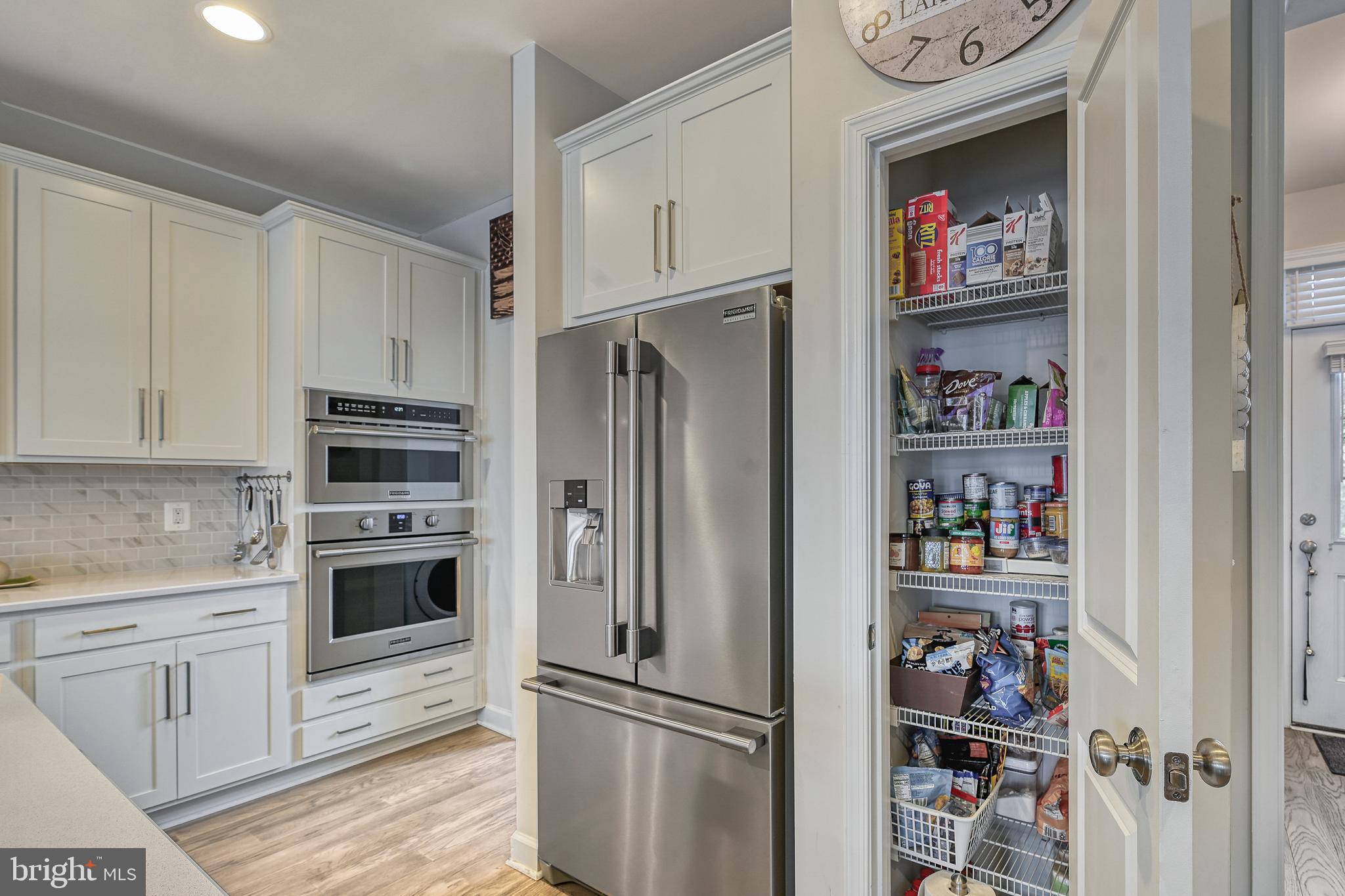 287 Sunset Loop Mineral, VA 23117 - Photo 31 of 112 a kitchen with stainless steel appliances a refrigerator and cabinets