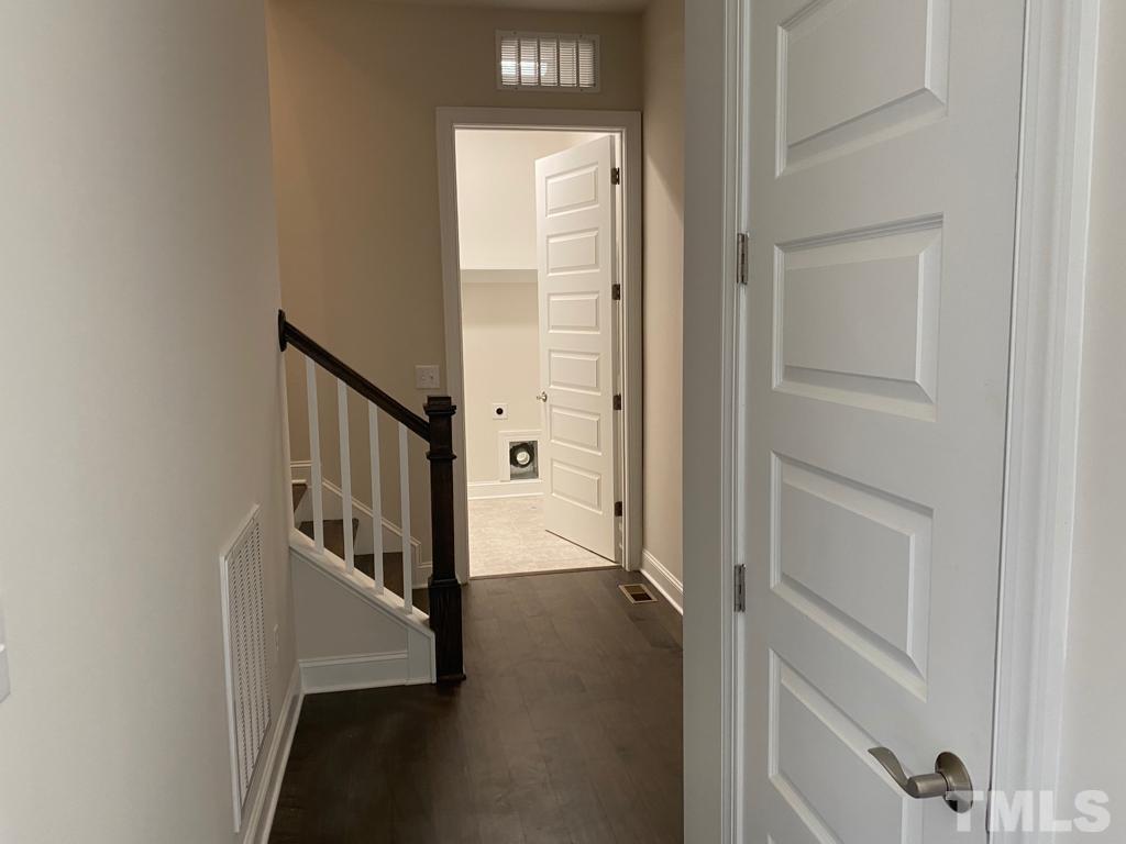 1185 St Cloud Loop Apex, NC 27523 - Photo 10 of 18 a view of entryway with wooden floor