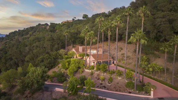 a view of a city with flower garden