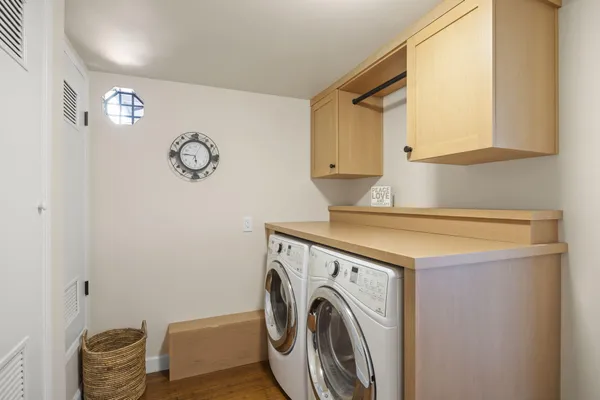 a view of a chairs and table in patio