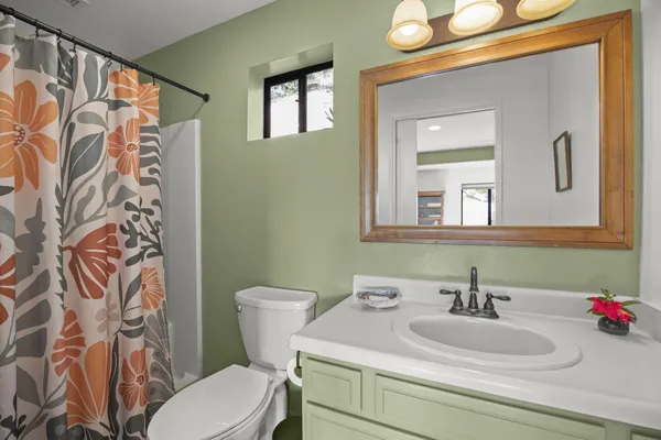 a dining room with furniture and entryway